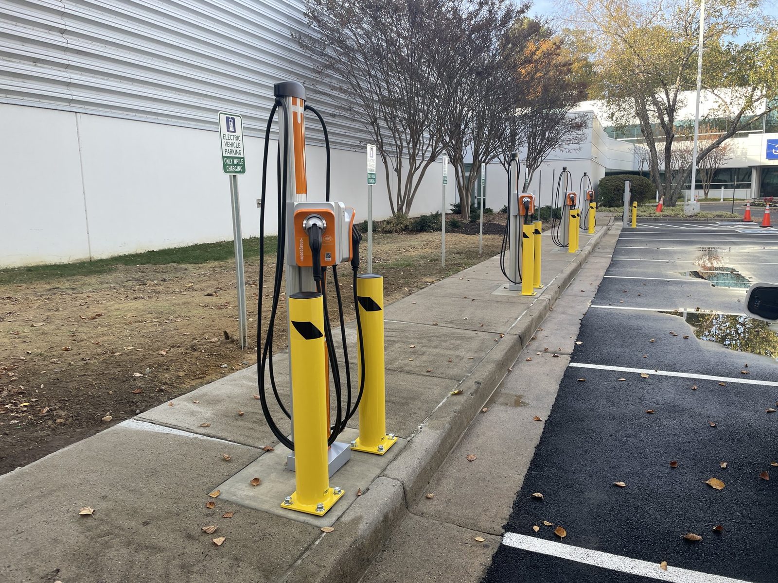 Row of commercial ChargePoint EV charging stations installed by GreenKey at a Virginia facility